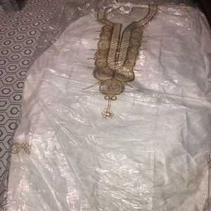 Im selling two African Outfits N One Man Outfit